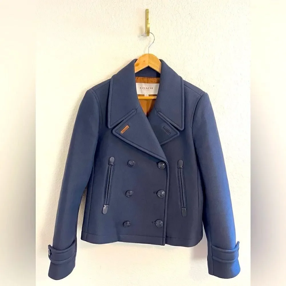 Coach Navy Peacoat with a nautical style. Medium